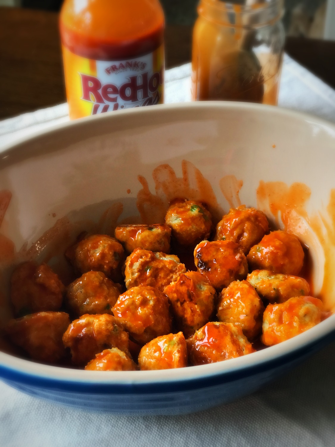 Keto buffalo chicken meatballs are all the goodness of wings without the mess! A nearly zero carb keto snack for a keto party.