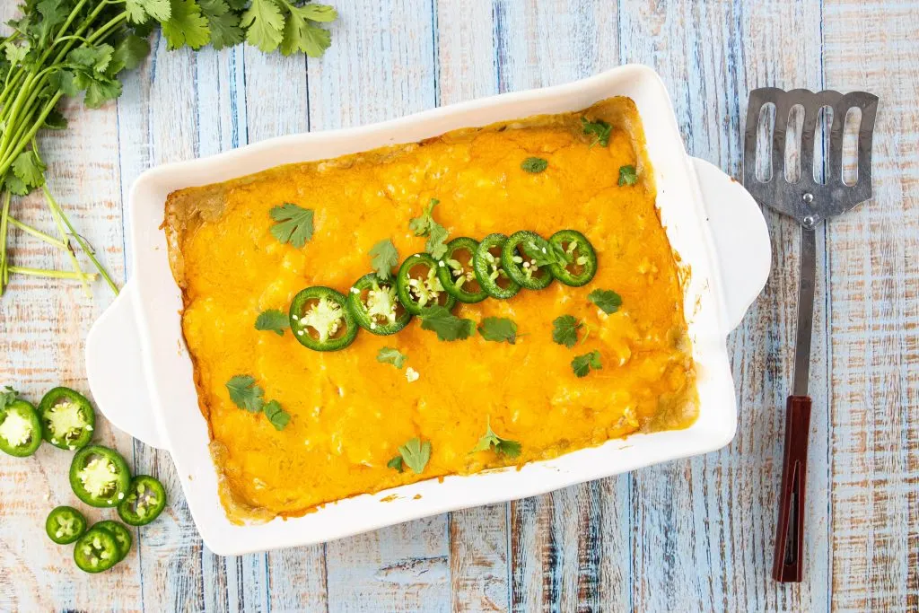 My low carb Mexican lasagna is a creamy, cheesy 30 minute meal and a great way to repurpose leftover chicken. Serve with a side salad and Mexican cauliflower rice for a super filling keto friendly supper