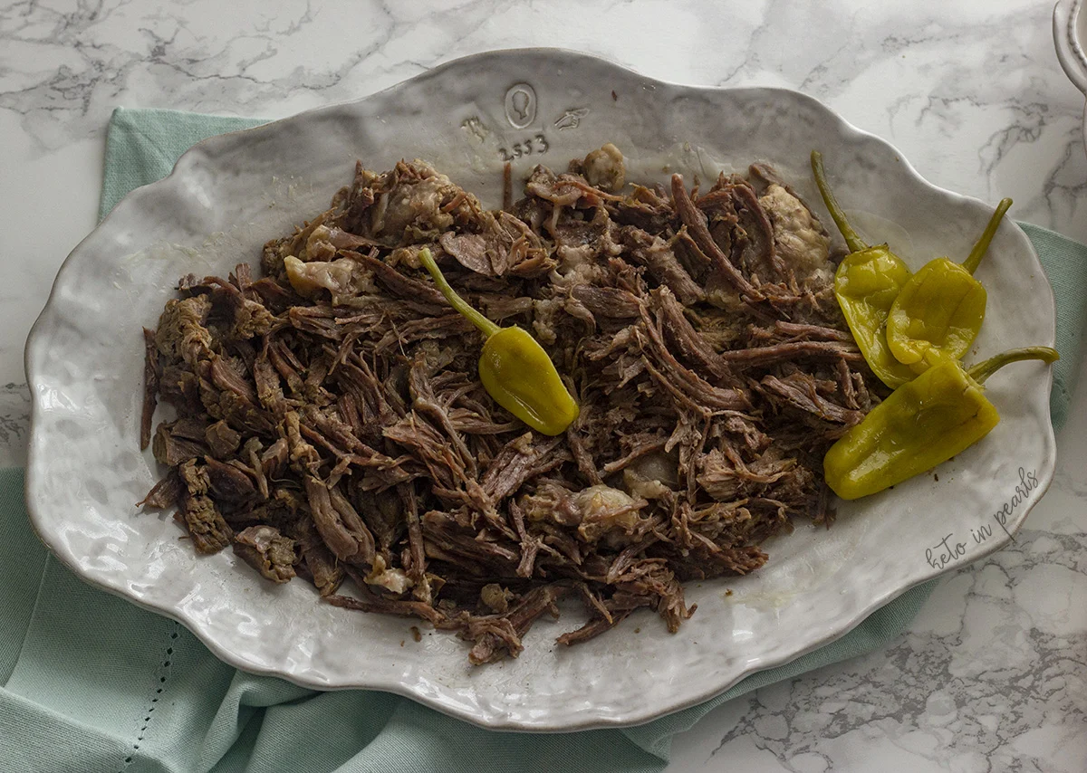 A tangy and savory keto Mississippi pot roast that is zero carbs! One secret ingredient sets this recipe over the top! Crock pot or Instant Pot options!