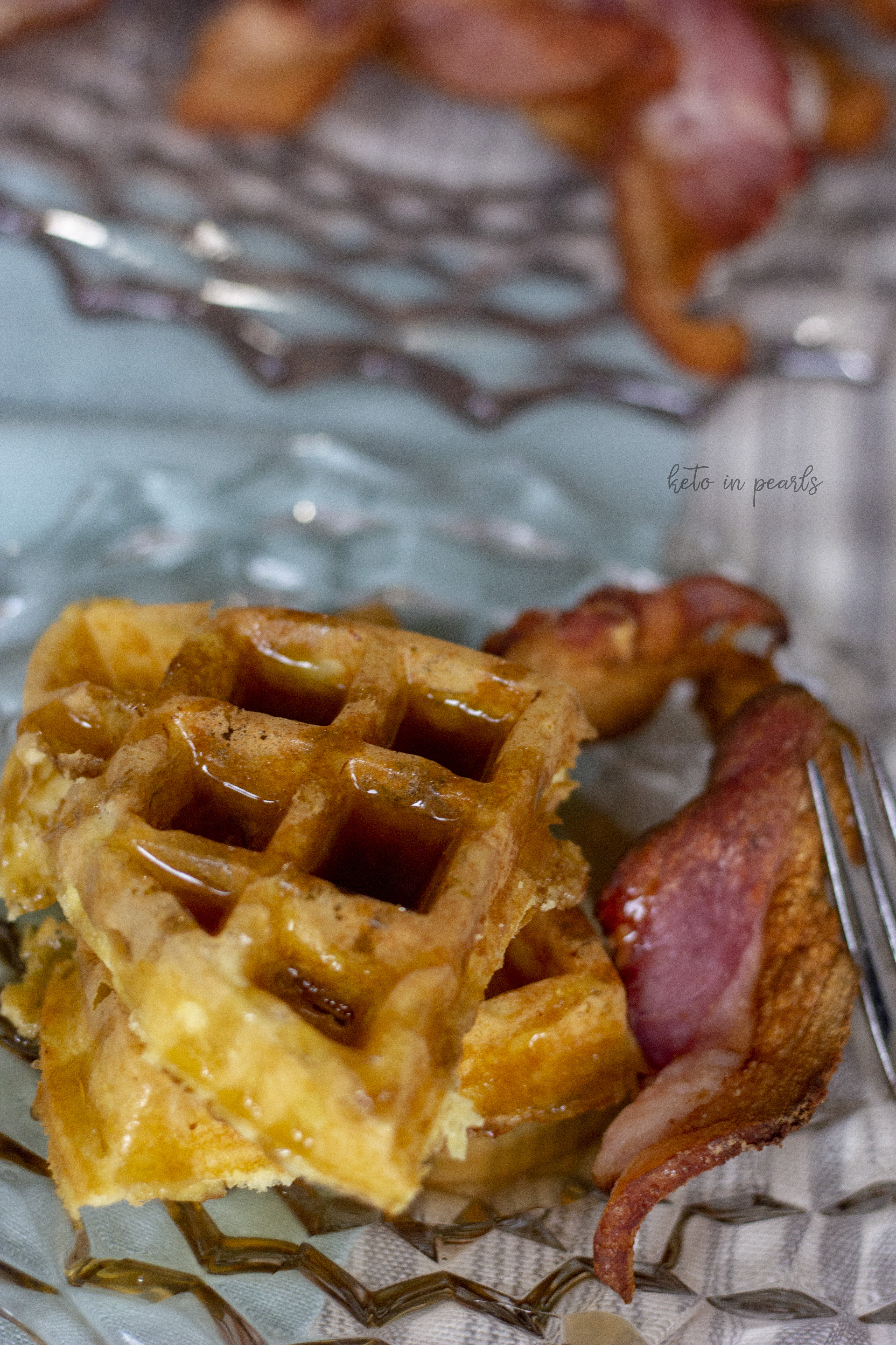 Fluffy keto waffles fit for a lazy Saturday morning! Only 3 net carbs per serving and perfect paired with your favorite sugar free maple syrup.