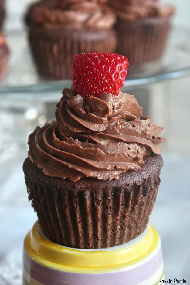 Sugar free, gluten free, and low carb chocolate cupcakes! Basic ingredients and easy enough for a weeknight treat! Only 1 net carb per cupcake.