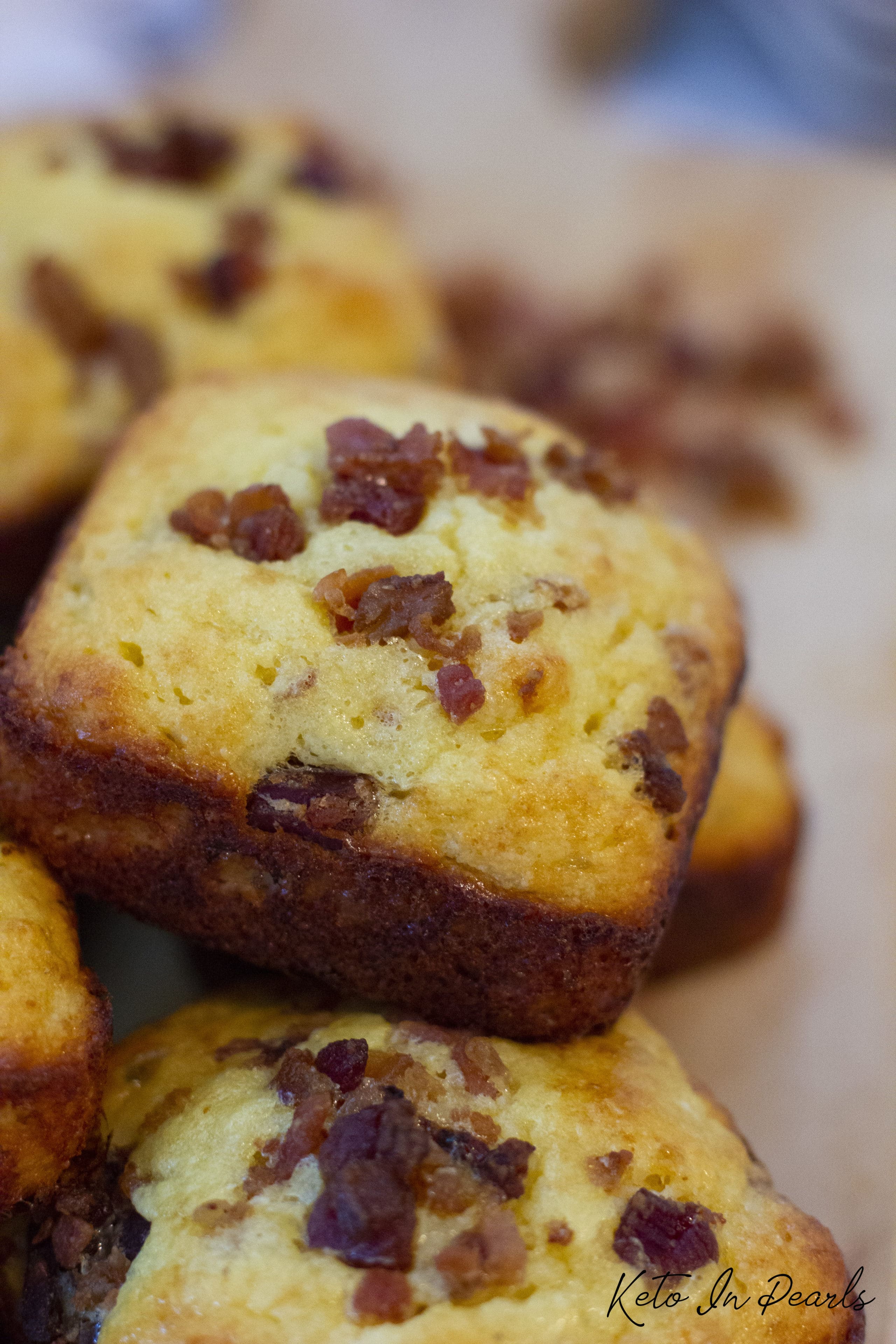 A sweet and salty maple keto bacon cornbread that is grain free, gluten free, and keto friendly. Only 2 net carbs per muffin. The best sweet keto cornbread!