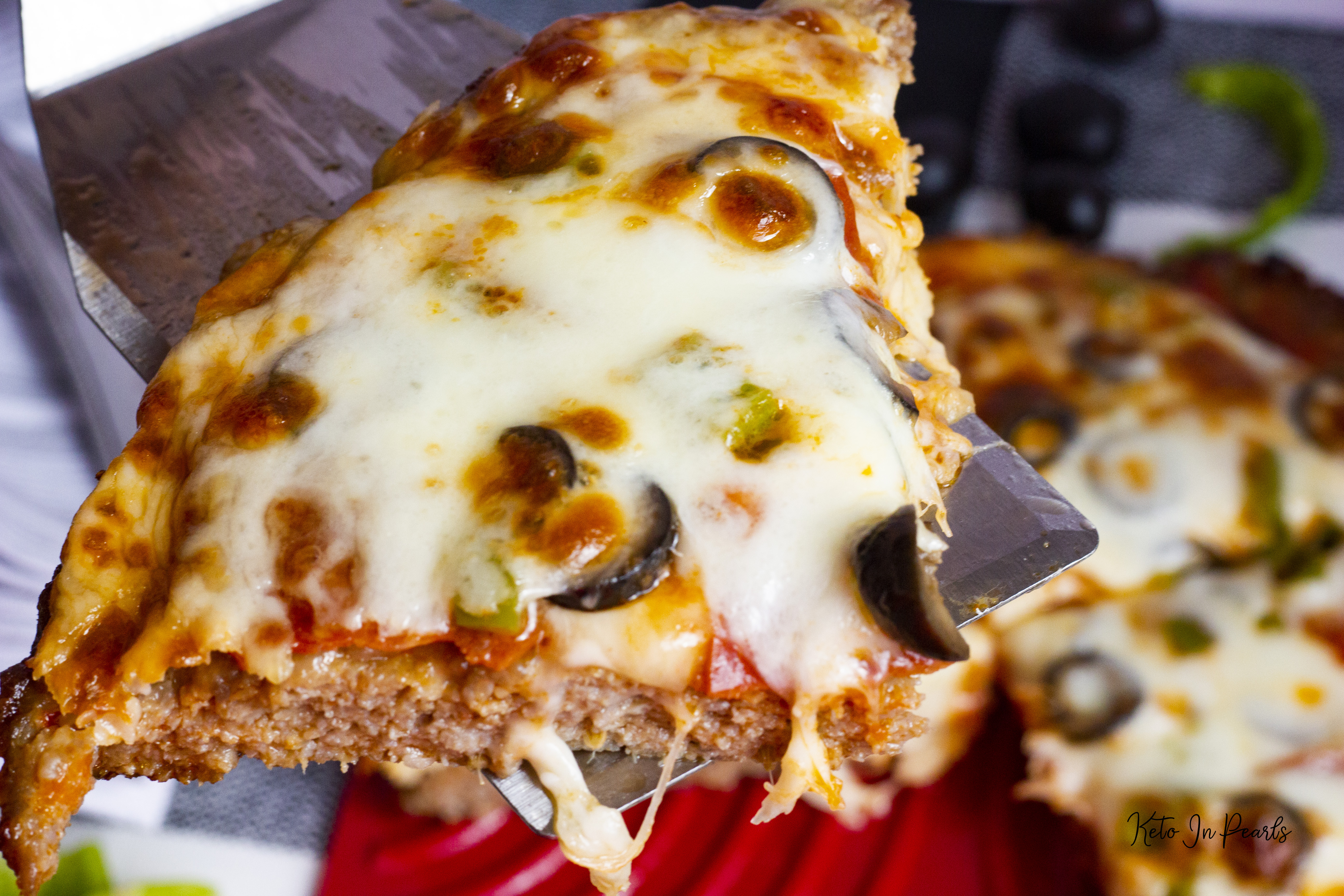 Crustless meat lovers keto pizza ready in under 30 minutes. Grain free, nut free, carnivore friendly, low carb, and keto friendly. 