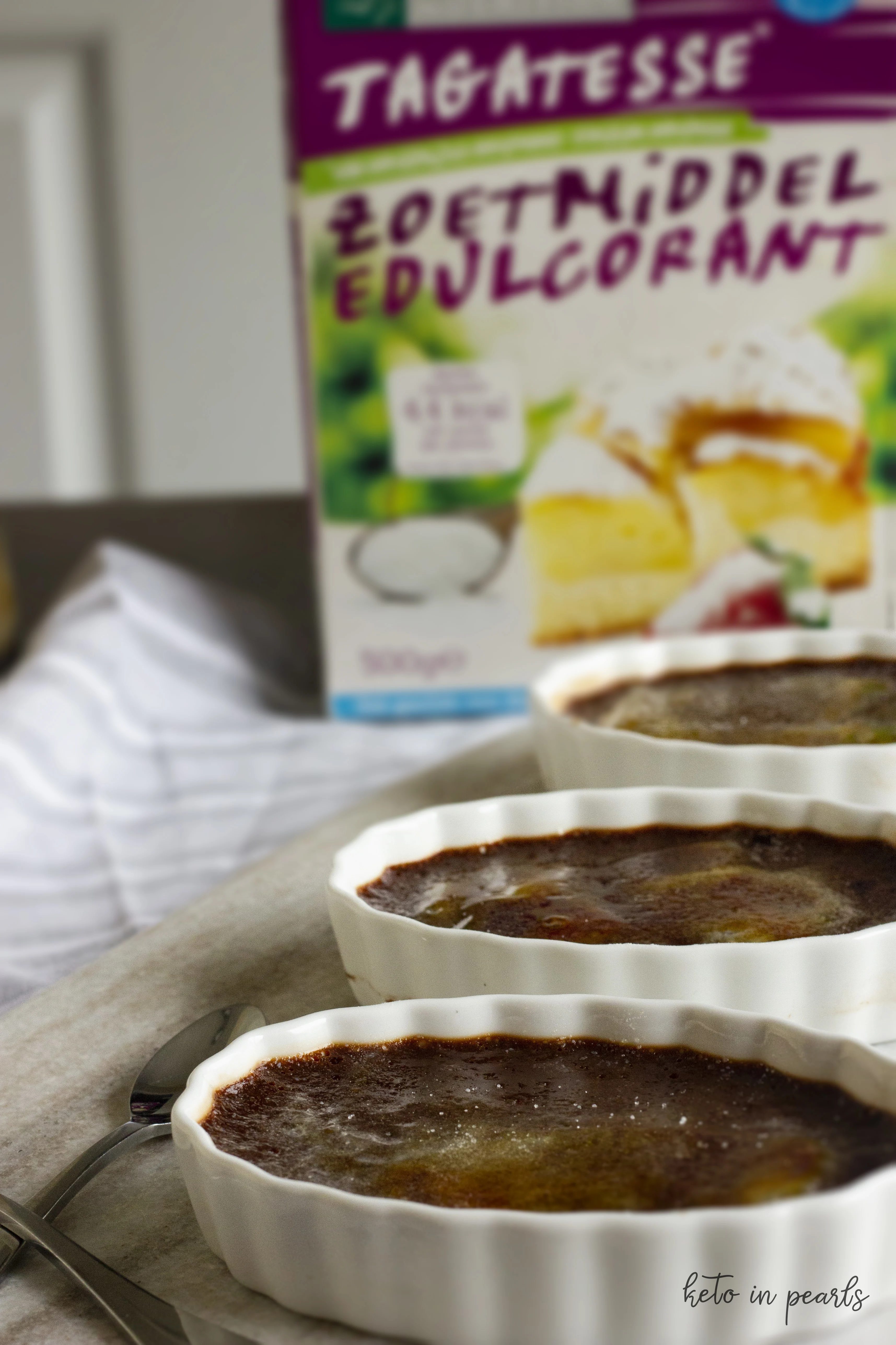 Keto chocolate pots de creme are a silky and decadent chocolate custard with a tagatose crystallized shell. Only 5 net carbs per serving and sugar free.