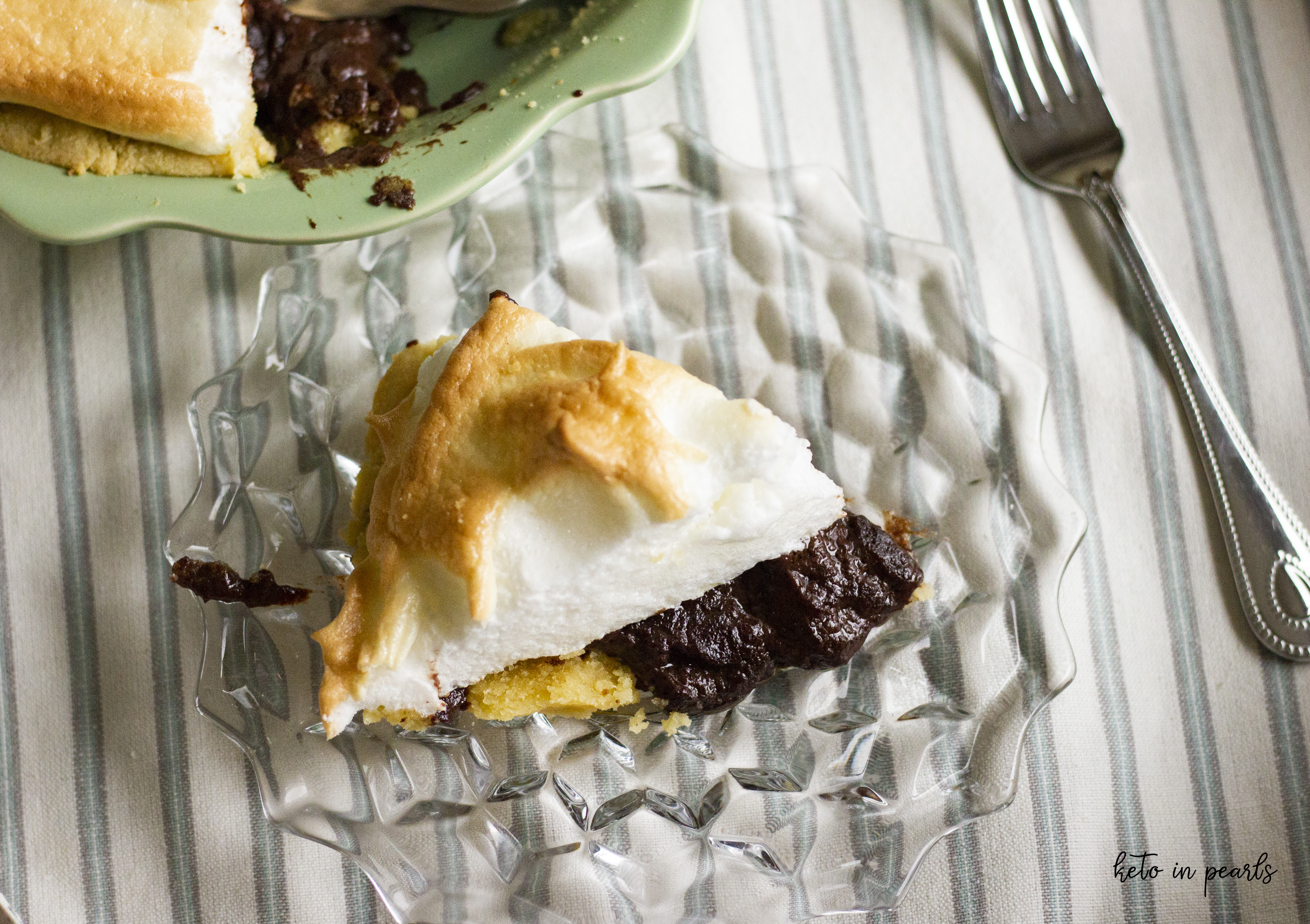 Keto chocolate pie with mile high meringue. Only 3 net carbs per serving and basic ingredients!