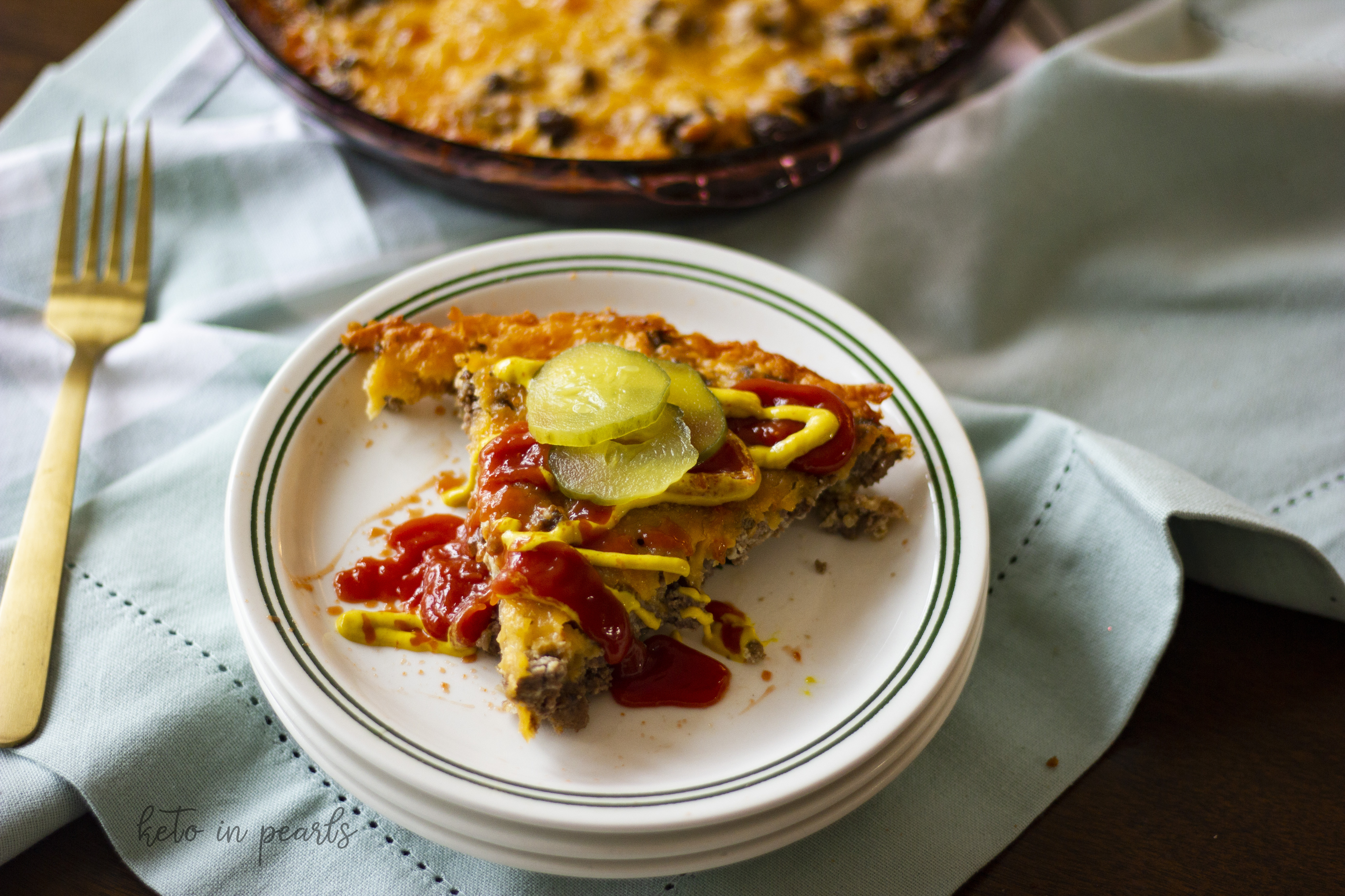 Keto Cheeseburger Pie is a low carb alternative to the bunless burger. A 30 minute meal the whole family will enjoy! Only 2 carbs per serving.