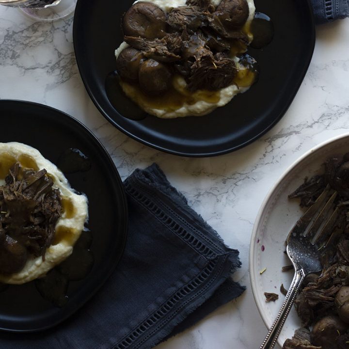 Dry red wine is paired with fragrant rosemary, aromatic thyme, and spicy garlic to elevate this dairy free keto pot roast to the next level. Instant Pot and CrockPot instructions included.
