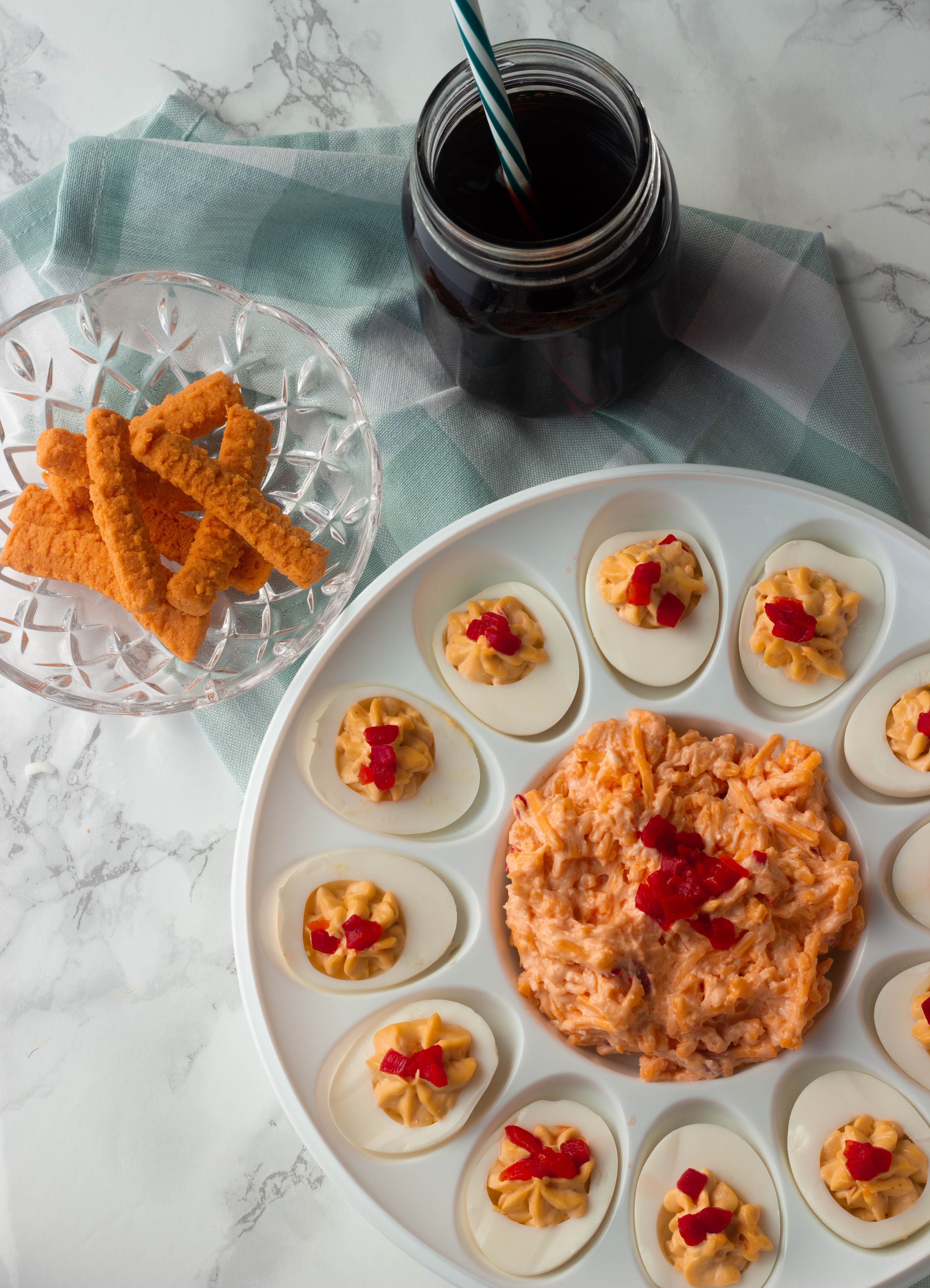 Classic deviled eggs give a nod to the South with these Pimento Cheese Deviled Eggs. A zero carb keto snack perfect for egg fasts or a Masters viewing party!