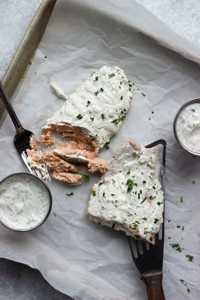 Keto sheet pan salmon with fresh herbs. Ready in under half an hour and only 1 carb per serving.