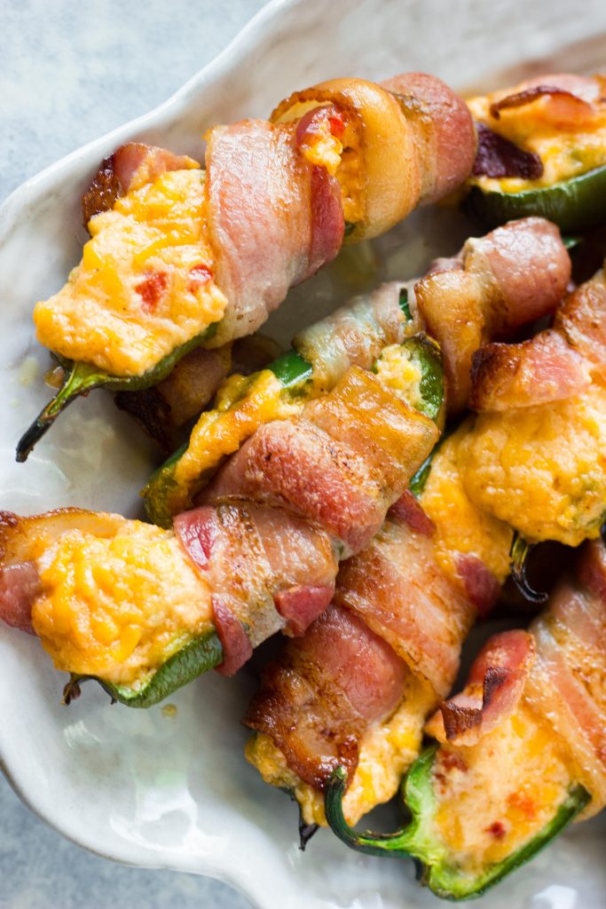 These keto jalapeño poppers are not your average keto snack. Pimento cheese steals the show in this 3 ingredient keto jalapeno popper recipe.