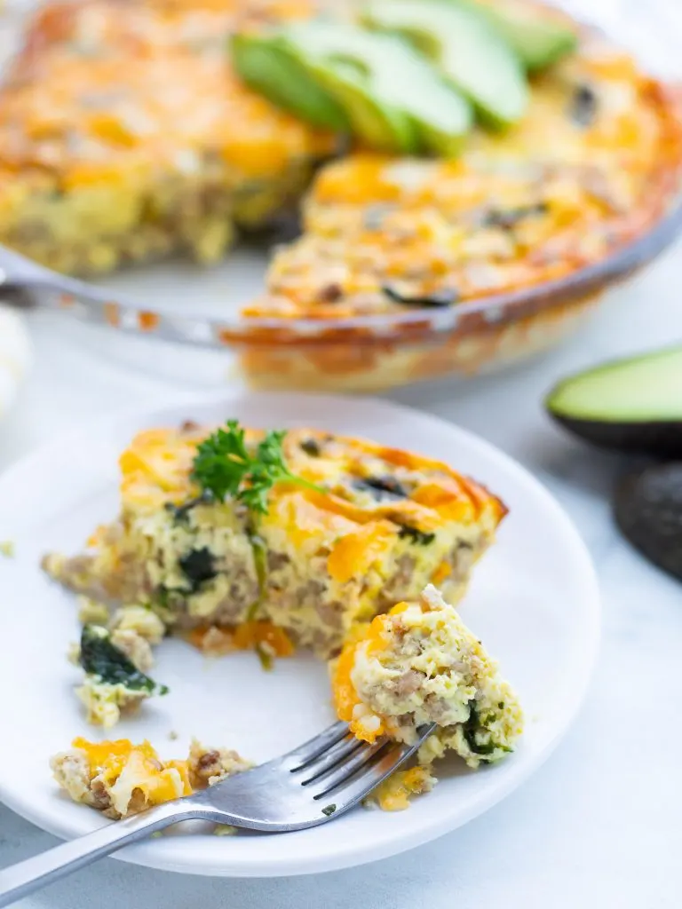 Savory and satisfying, this easy keto quiche with sausage and spinach is a treat any time of day. Whether it's breakfast, brunch, or dinner, you're going to love this crustless twist on a French classic. 