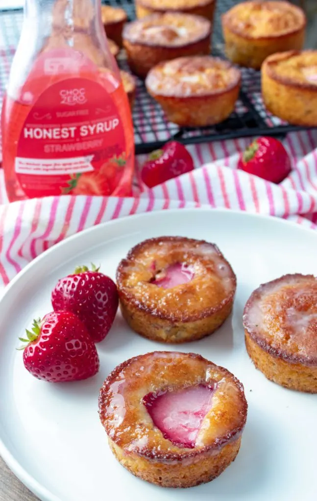 One bowl keto and low carb strawberry muffins use common low carb ingredients, fresh strawberries, and zero sugar. Only 2.8 net carbs and 164 calories each.