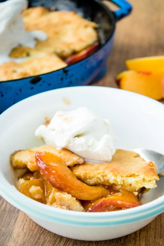 A rustic Southern inspired low carb peach cobbler that is free of added sugar, gluten, and can also be dairy free! Enjoy peaches on your low carb diet with this easy low carb peach cobbler.