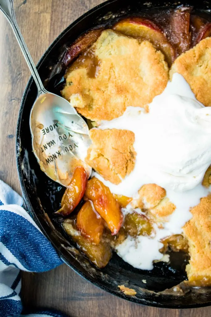 A rustic Southern inspired low carb peach cobbler that is free of added sugar, gluten, and can also be dairy free! Enjoy peaches on your low carb diet with this easy low carb peach cobbler.