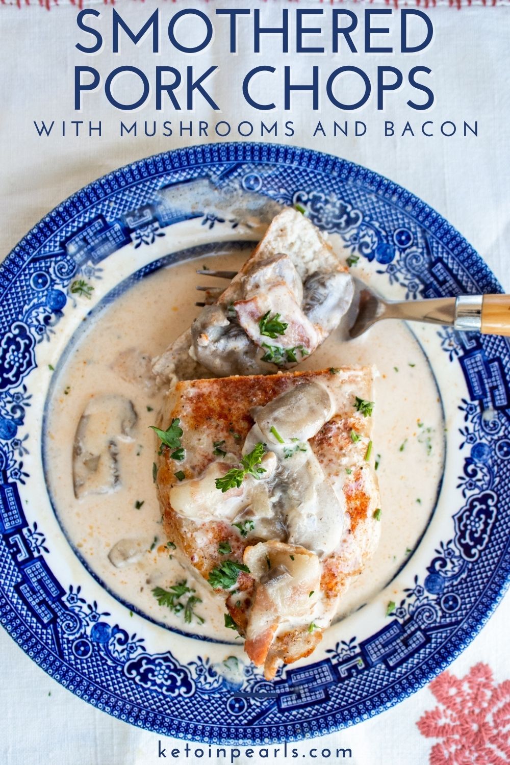 Thick cut boneless pork chops are seasoned and baked in the oven before getting smothered in a bacon and mushroom cream sauce.