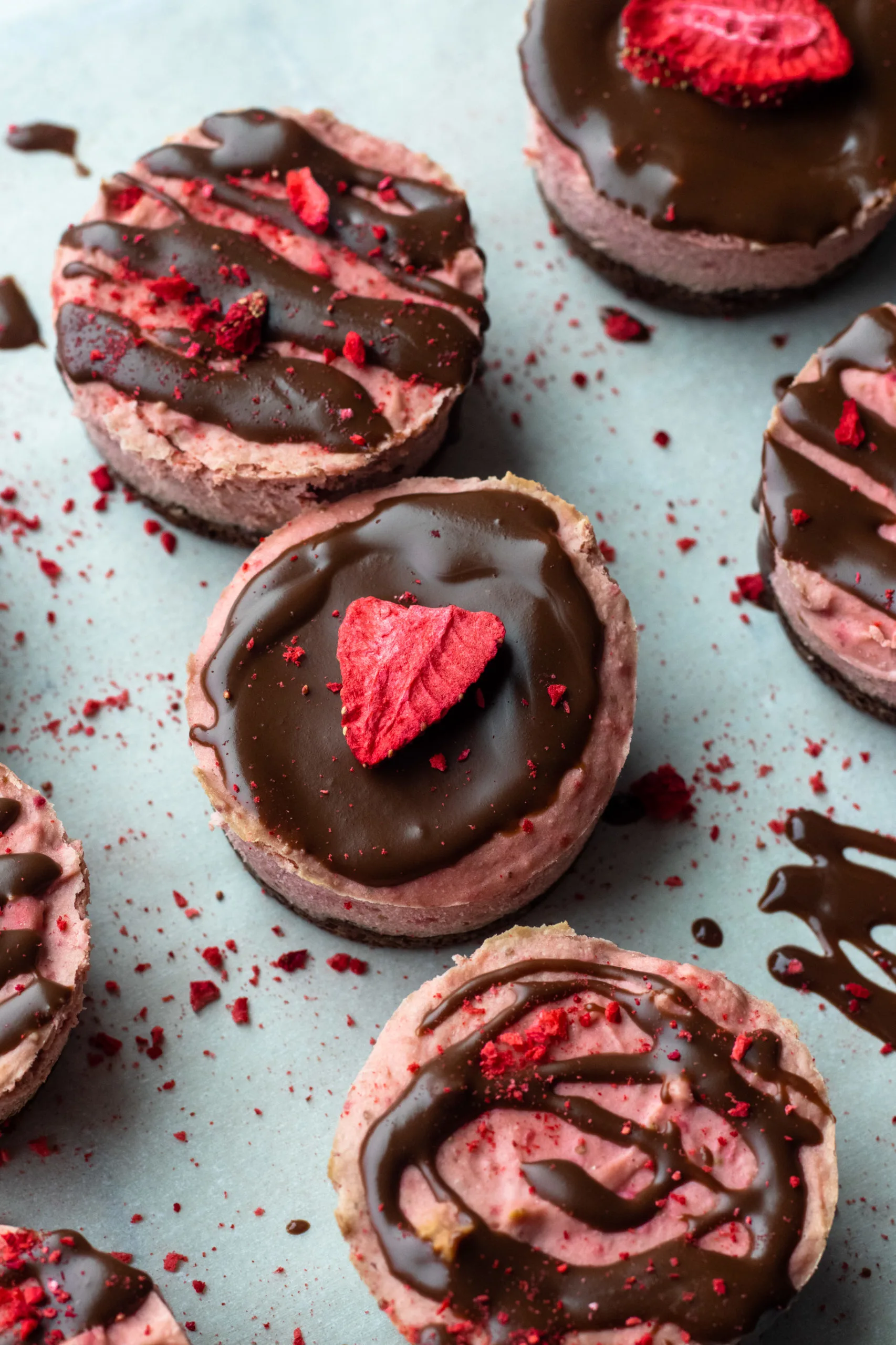 Dark chocolate covered strawberry low carb cheesecakes.