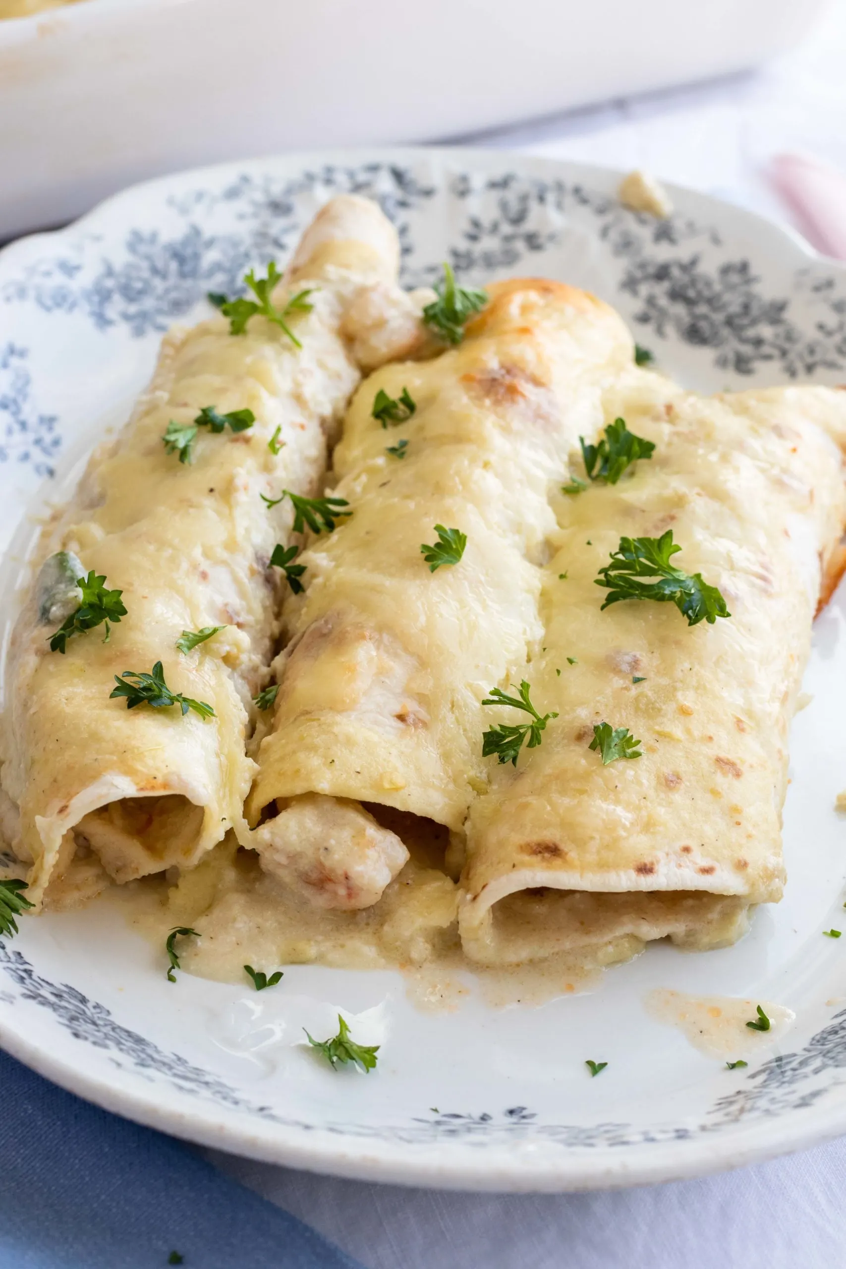 Low carb shrimp enchiladas in a homemade cheese sauce.