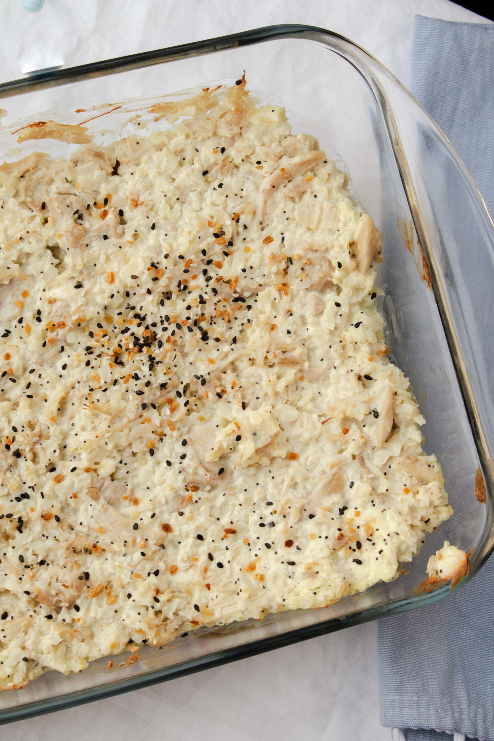Everyone's favorite bagel seasoning shines in this low carb casserole with chicken and cauliflower rice. Easy to make and video tutorial included.