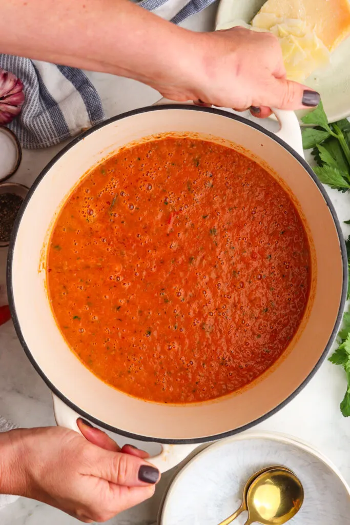 Healthy Roasted Tomato Basil Soup featured image below soup in a pot